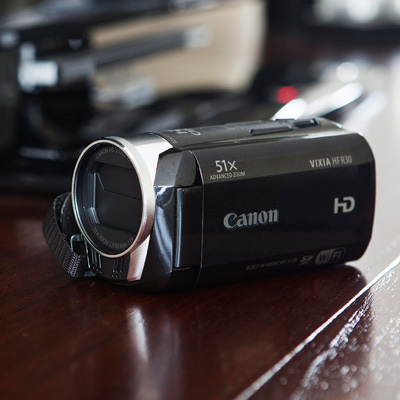 CANON® VIXIA HF R30 - Compact and easy to use, this camera delivers breathtaking full HD video. Features 51x Advanced Zoom and SuperRange Optical Image Stabilization, 3.28 Megapixel Full HD CMOS sensor, DIGIC DV III image processor and 3.0-inch Flat Touch Panel LCD with a new graphical user interface for easy touch control.